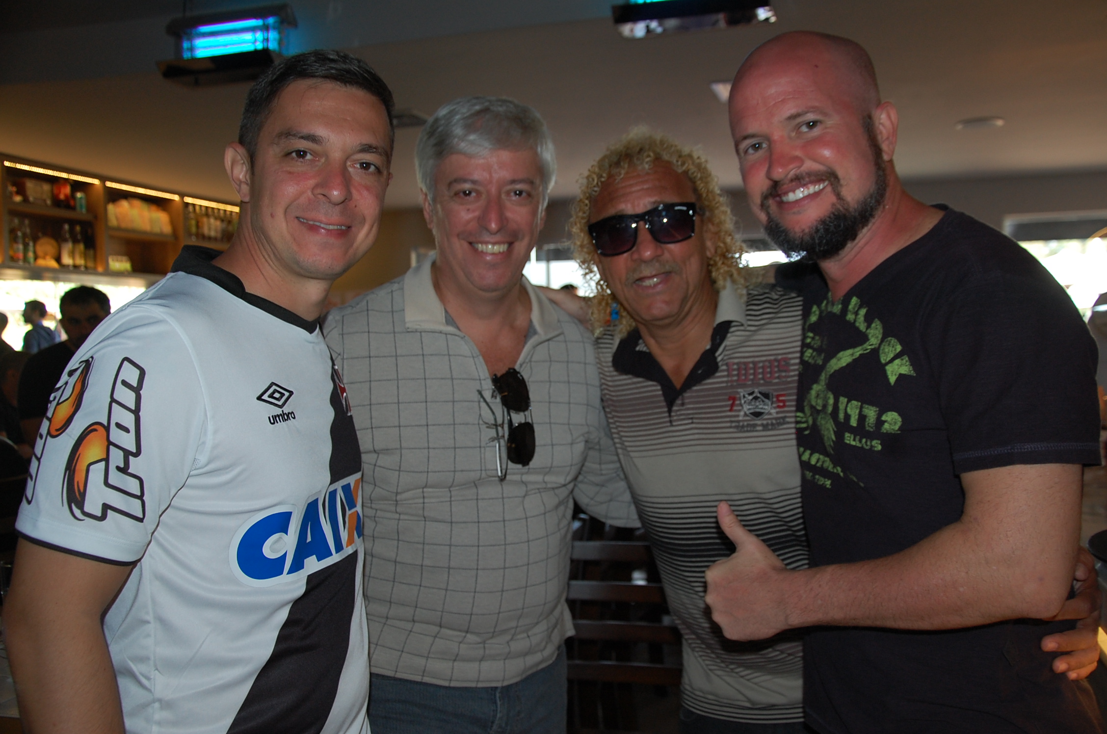 Ricardo Assalim, Sérgio Augusto e Fred Cavalcante, da Trend com o craque Biro Biro
