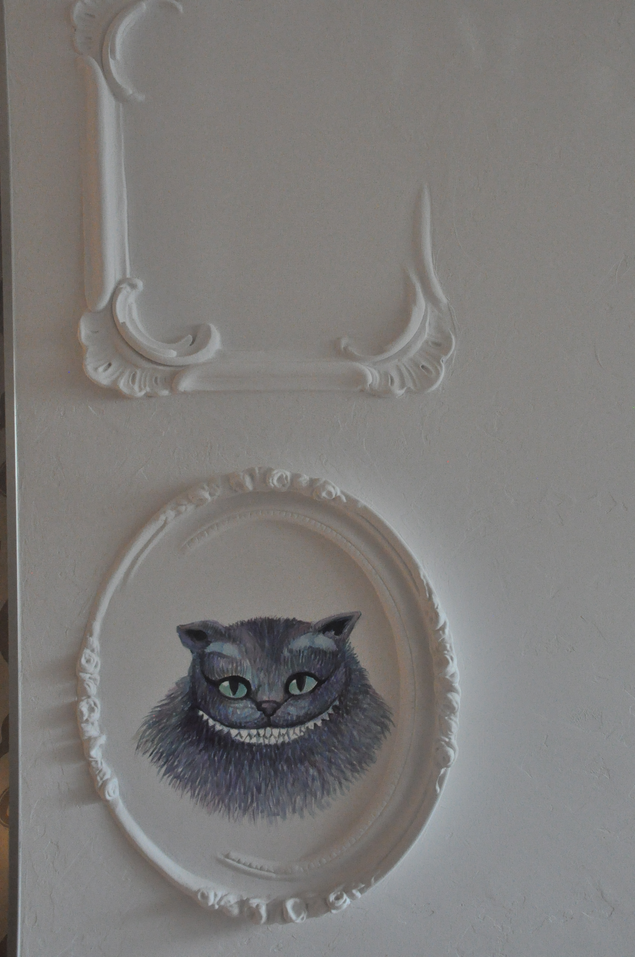 Imagem do Gato de Cheshire ou Gato Que Ri, de Alice no País das Maravilhas