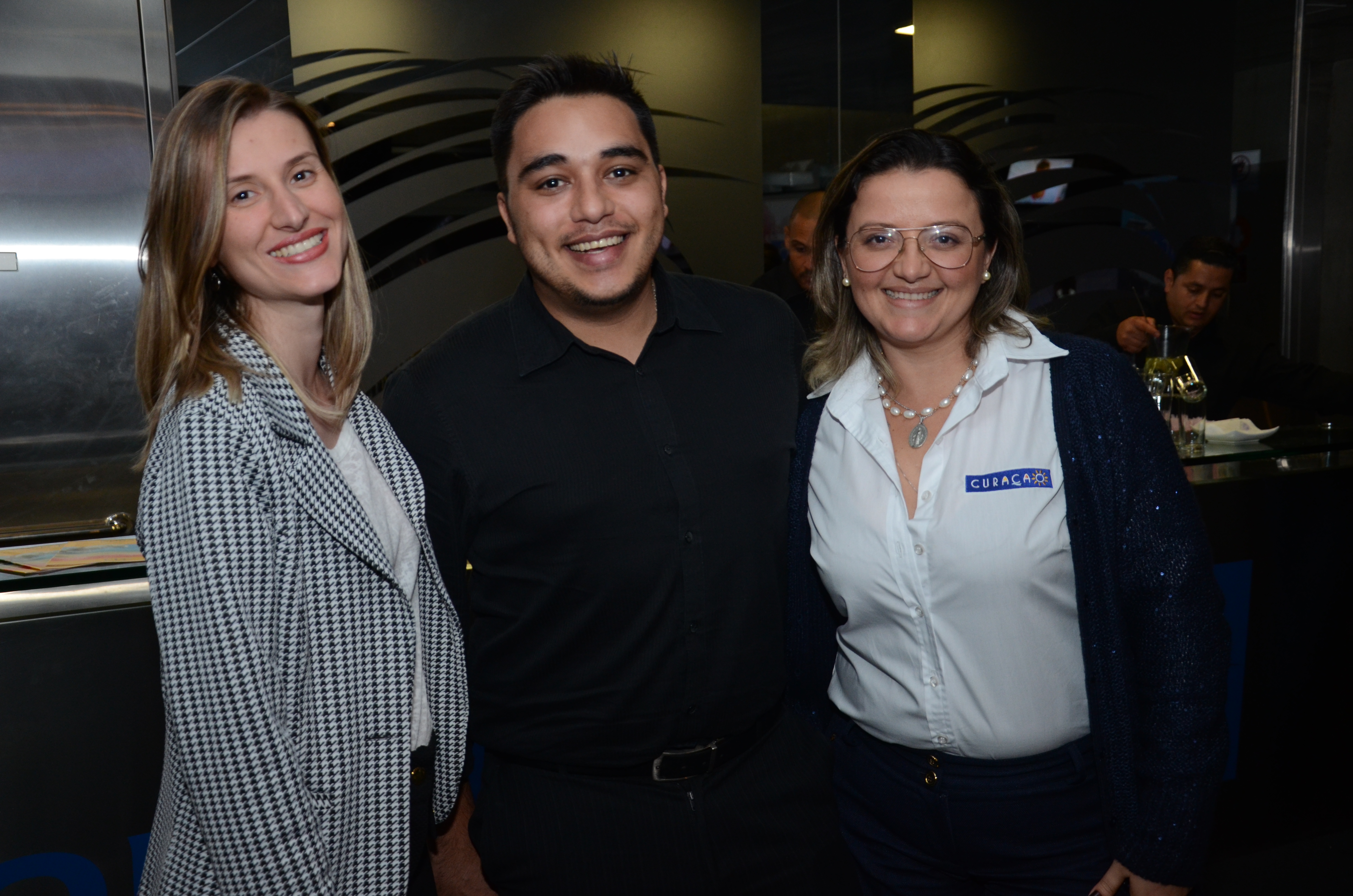 Luana Costenaro e Bruno Melo, da Copa Airlines, e Janaina Araujo, de Curaçao Luana Costenaro e Bruno Melo, da Copa Airlines, e Janaina Araujo, de Curaçao