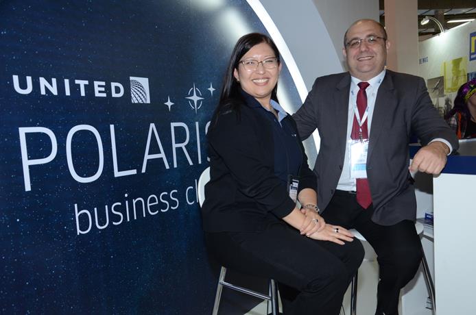 Tatiana Arantes, da United Ailines, e Martini, da Avipam Turismo