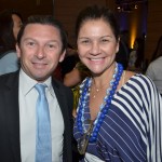 Adriano Aguiar, da Hertz, com Danielle Roman, da Interamerican