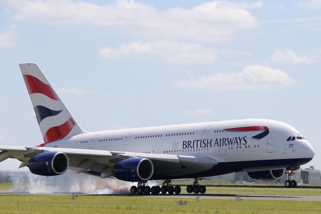 A British Airways Airbus A380 lands at the Le Bourget airport near Paris, one day before the start of the 50th Paris Air Show, June 16, 2013. The Paris Air Show runs from June 17 to 23. REUTERS/Pascal Rossignol (FRANCE - Tags: BUSINESS TRANSPORT)