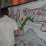Participantes foram convidados para colorir quadro gigante que remetia à cultura do Texas