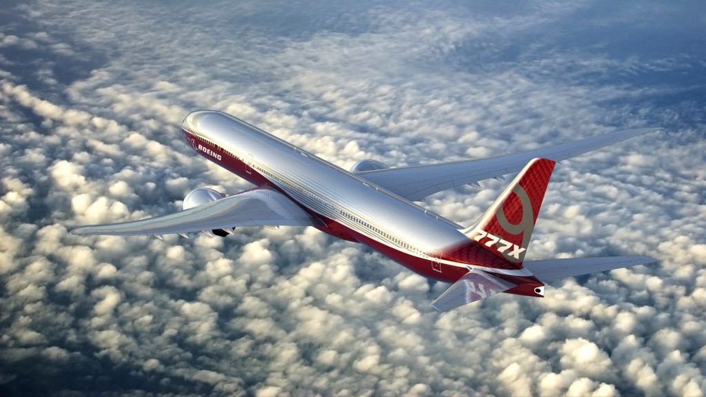 Boeing Company completa 100 anos de história; veja especial 9 777-9X Images; K66137-03; 777x; view from left ; 777x over clouds; full plane view;