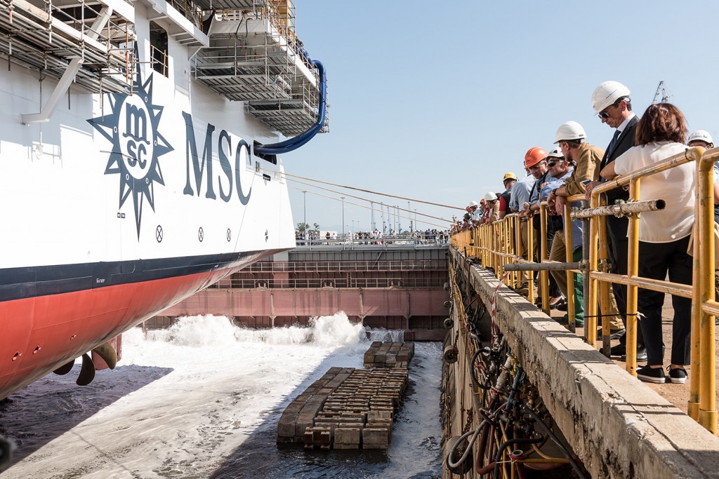 Water enters the dry dock for MSC Seaview to float for the first time