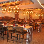 Texas Smokehouse, um dos restaurantes de especialidades do navio que serve churrasco Texas Smokehouse, um dos restaurantes de especialidades do navio que serve churrasco