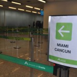 Anúncio do voo na fila do raio-x do Aeroporto de Brasília