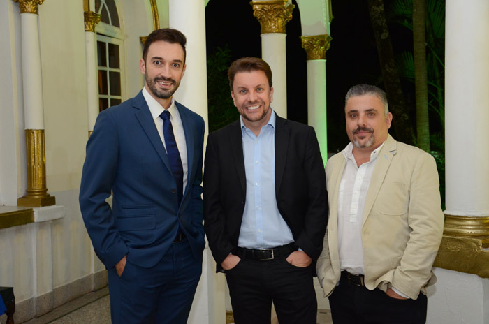 CNT comemora 18 anos e anuncia entrada na hotelaria; fotos 1 Rafael Monteiro, André Khouri e Jorge Khouri, da CNT