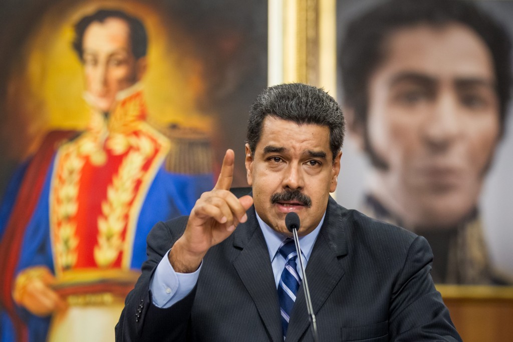 epa05312902 Venezuelan President Nicolas Maduro speaks during a press conference at the Miraflores Presidential Palace in Caracas, Venezuela, 17 May 2016. Maduro denounced the violation of Venezuelan airspace by US airplanes that flew over illegally two times in the last week. EPA/MIGUEL GUTIERREZ