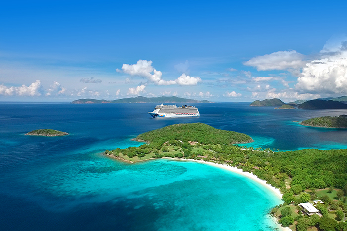 aerial view of Caneel Bay and Hawksnest Bay, St.John, US Virgin Islands with Jost Van Dyke and Tortola, British Virgin Islands in the background