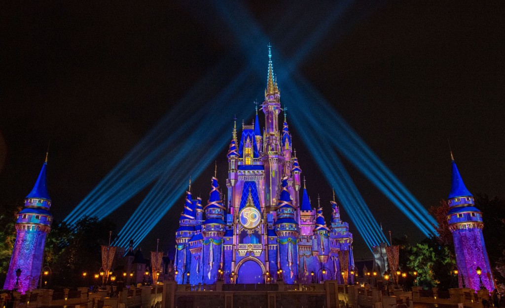Cinderella Castle illuminates with a dazzling radiance and pixie-dust sparkle when it transforms into a Beacon of Magic at Magic Kingdom Park at Walt Disney World Resort in Lake Buena Vista, Florida, as part of the resorts 50th anniversary celebration. (David Roark, photographer)