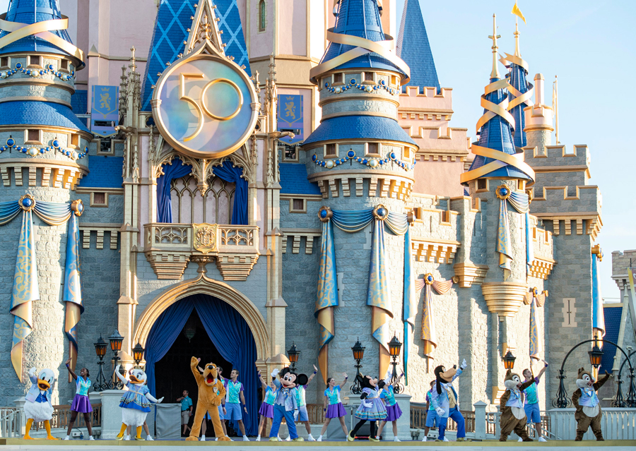 Mickey Mouse, Minnie Mouse and pals welcome guests to Magic Kingdom Park in front of Cinderella Castle, Oct. 1, 2021, on the 50th anniversary of Walt Disney World Resort in Lake Buena Vista, Fla. (David Roark, photographer)