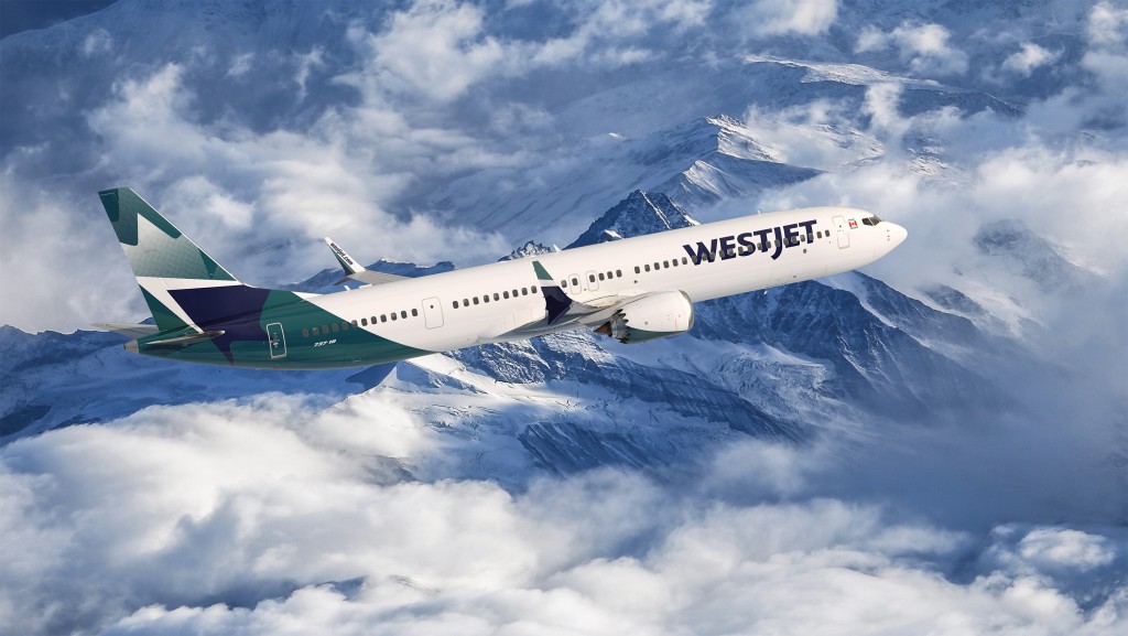 WestJet anuncia pedido de até 64 Boeing B737 MAX 10s 1 An aerial photo above the clouds with a tiny moon in the distance