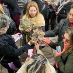 Agentes de viagens brindando com os produtos da Vitivinícola Jolimont