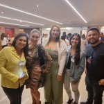 Agentes aguardando inicio do evento no Welcome Coffee