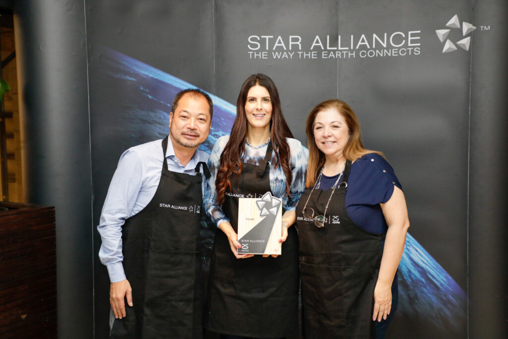 Flávia Pirola, da Tyller, com Giancarlo Takegawa e Rosana Carvalho, da Air Canada