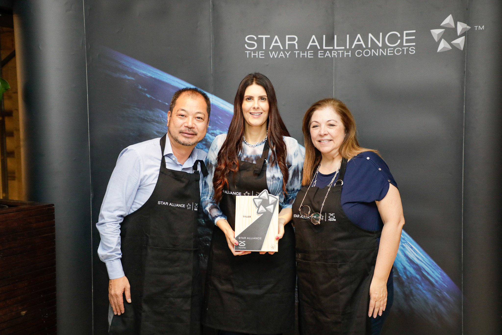Flávia Pirola, da Tyller, com Giancarlo Takegawa e Rosana Carvalho, da Air Canada