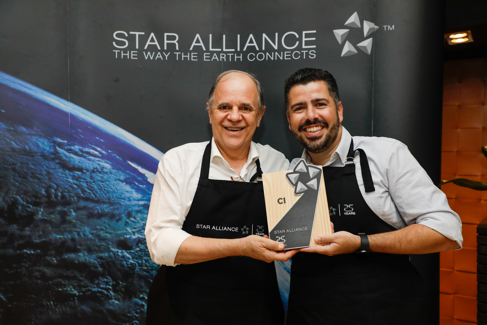 Victor Baseggio, da CI, com Raphael de Lucca, da Copa Airlines