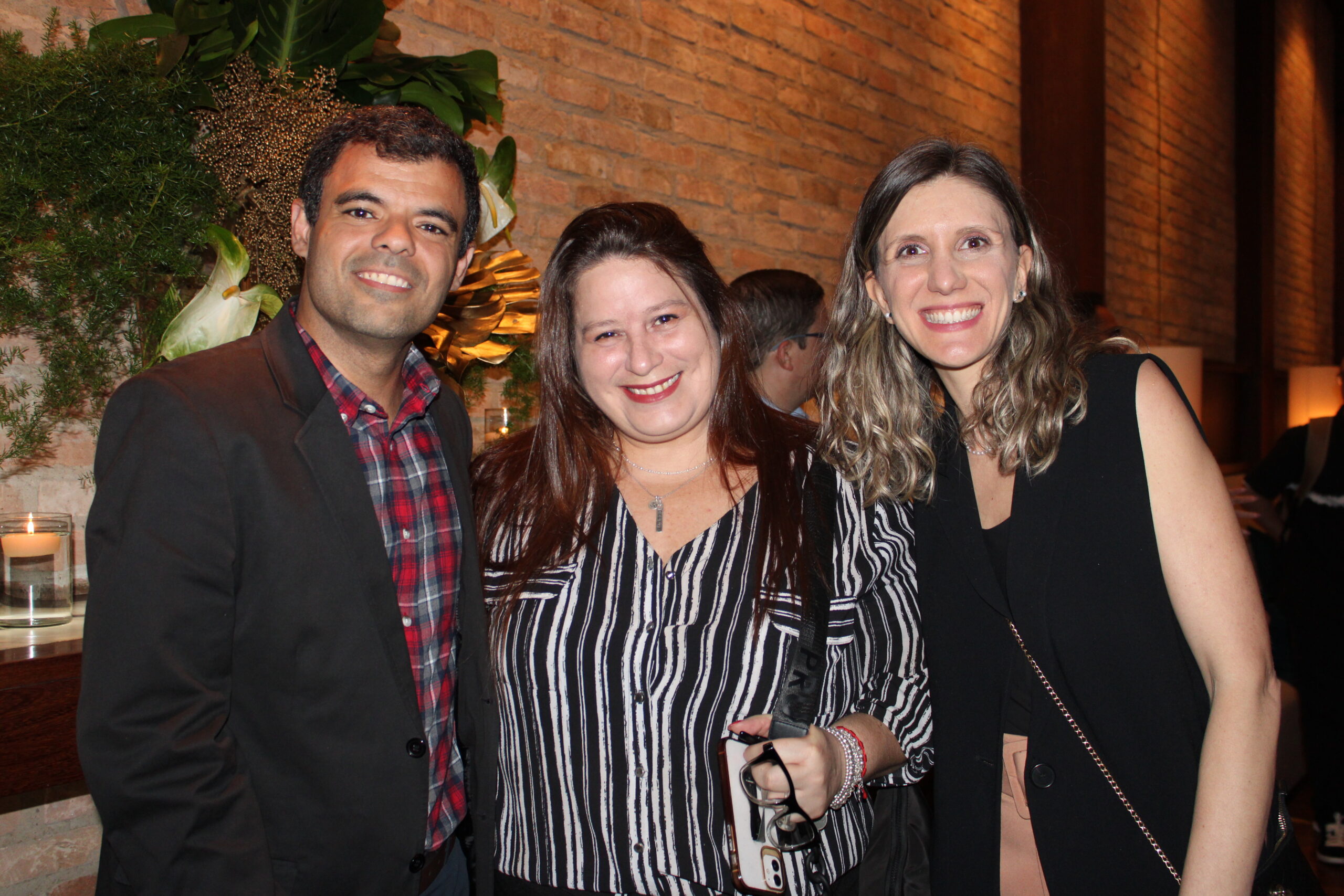 Renato Gonçalves, da Universal, Rafaela Brown, do Visit Florida, e Juliana Baraldi, da Universal