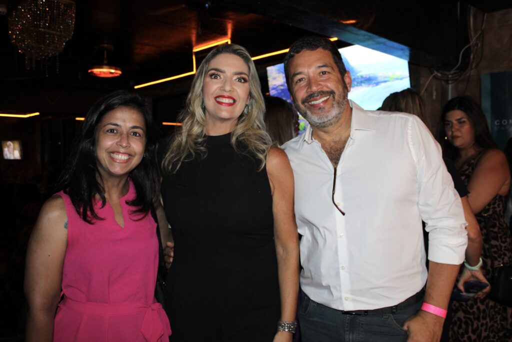 Carla Cecchele, da RCD, com Juliana Ribeiro e Jorge Souza, da Orinter