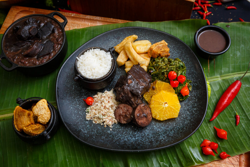 Hilton Barra e Copacabana terão feijoada e escolas de samba no carnaval