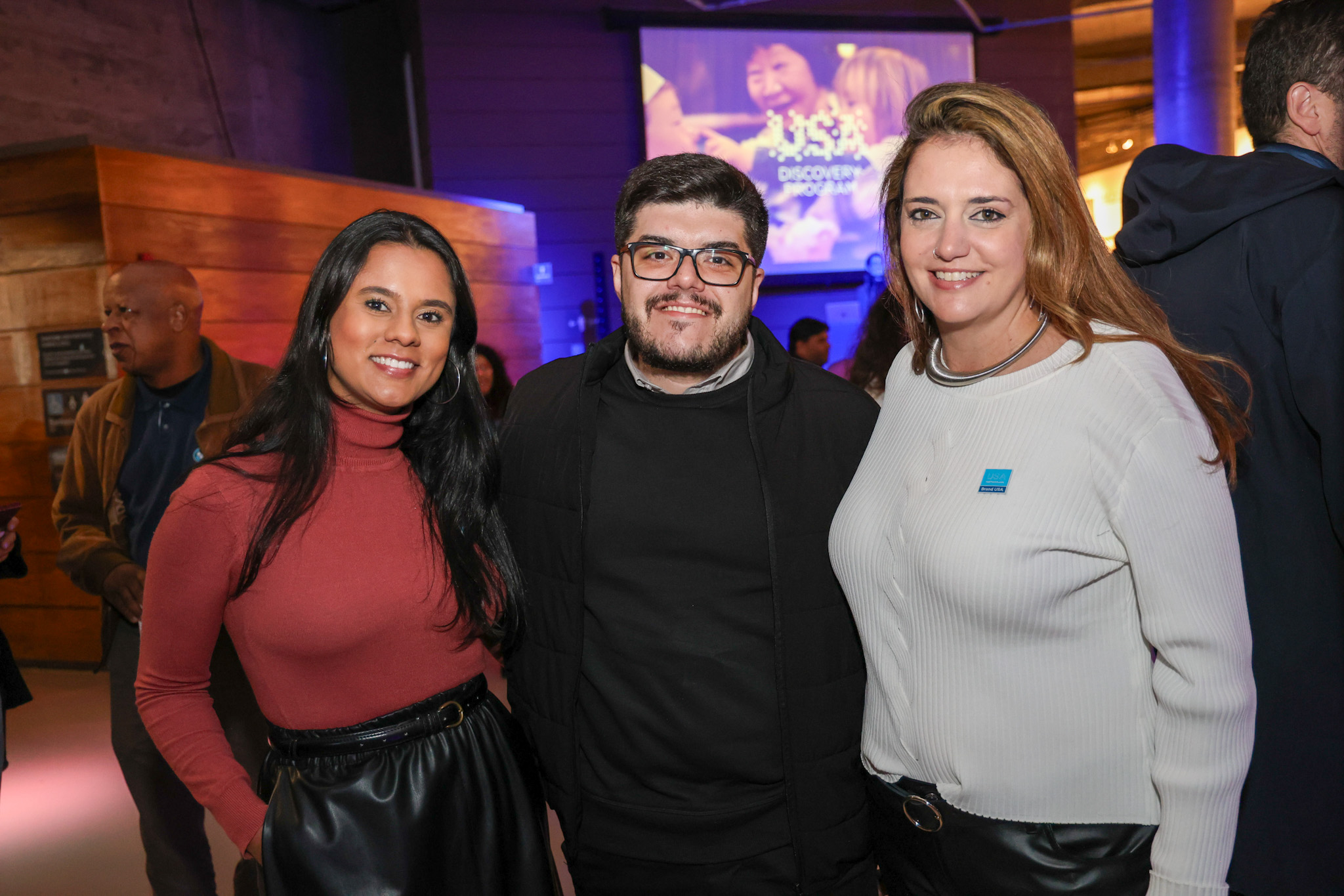 Paulo Biondo, da CVC Corp, entre Ingrid Santos e Ana Elisa Facchinato, do Brand USA Paulo Biondo, da CVC Corp, entre Ingrid Santos e Ana Elisa Facchinato, do Brand USA