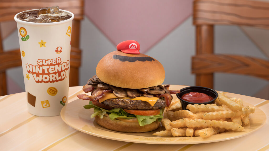 Mario Burger e mais: Universal revela menu gastronômico do Epic Universe 1 Mario Burger Bacon Mushroom Cheese at Toadstool Cafe in SUPER NINTENDO WORLD at Universal Epic Universe Mario Burger e mais: Universal revela menu gastronômico do Epic Universe
