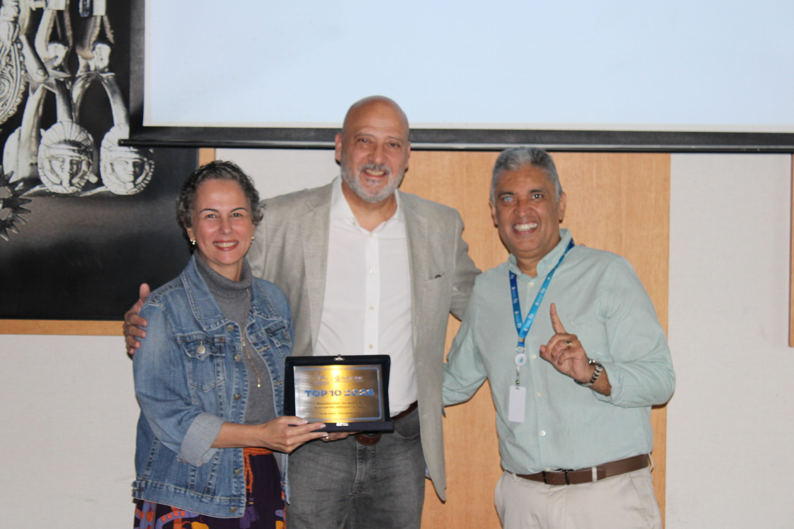 Alexandre Milessis e sua esposa, da Milessis Turismo, com Eduardo Aoki, da Intermac