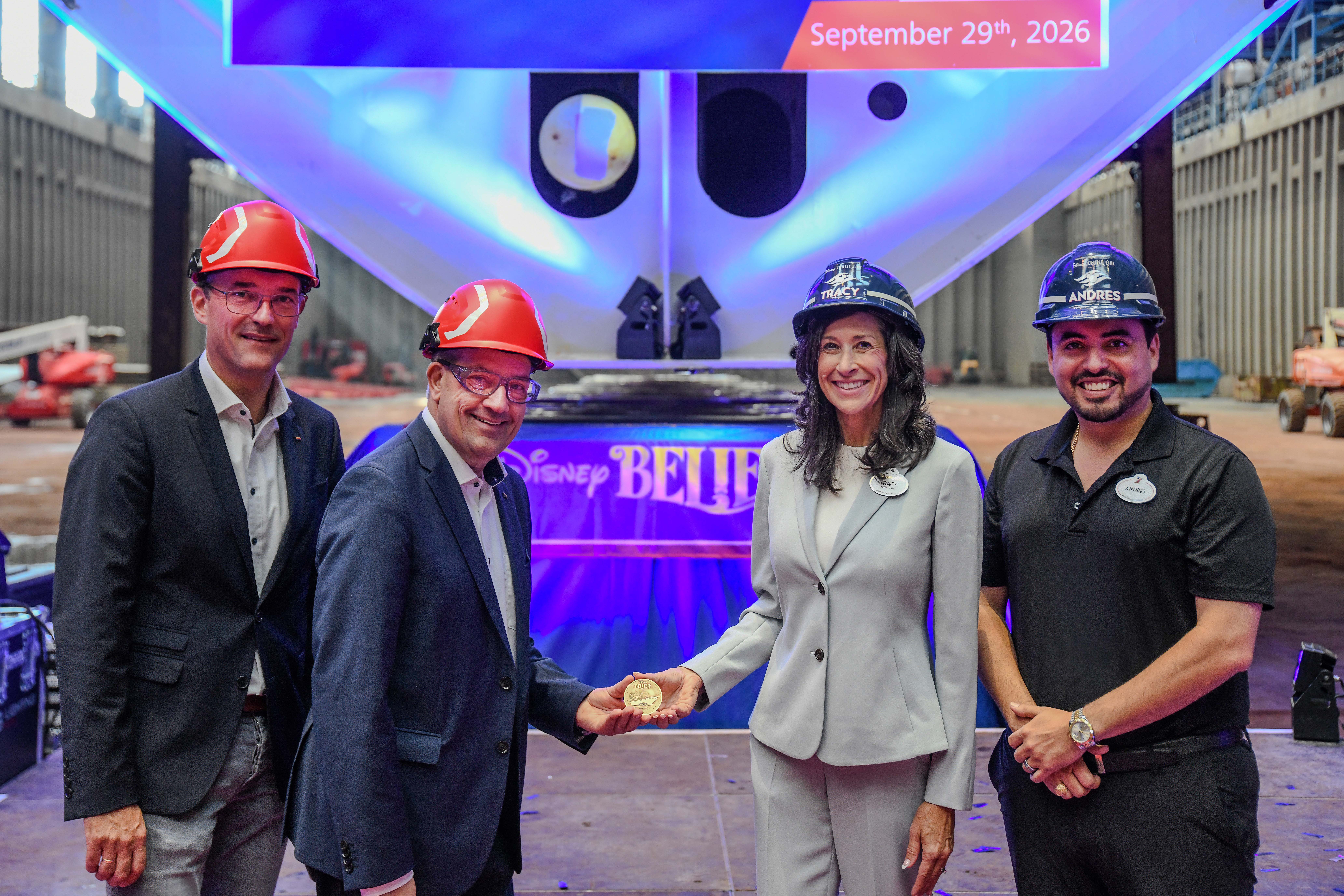 Meyer Werft COO Jörg Heidelberg and CEO Andre Walter join Disney Cruise Line Senior Vice President and General Manager Tracy Wilson and Portfolio Executive Project Management at Walt Disney Imagineering Andres Ovalles for the Disney Believe's Keel Laying ceremony at Meyer Werft shipyard. (Robert Fieback, photographer)